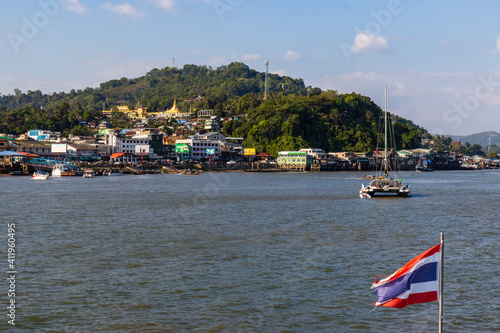 KAWTHAUNG, MYANMAR - MAY 05 2020: View of the port and harbour area of the Burmese town of Kawthaung on the border with Thailand photo