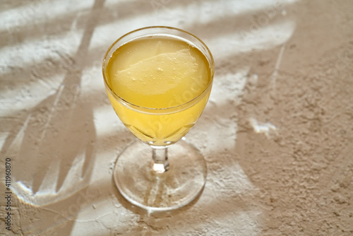 A glass of probiotic tibi drink in a glass photo