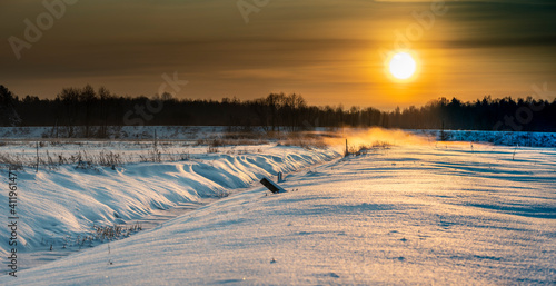 Snow-coverd, frozen fields and meadows, eastern Poland, beautiful sunrise, Podlasie