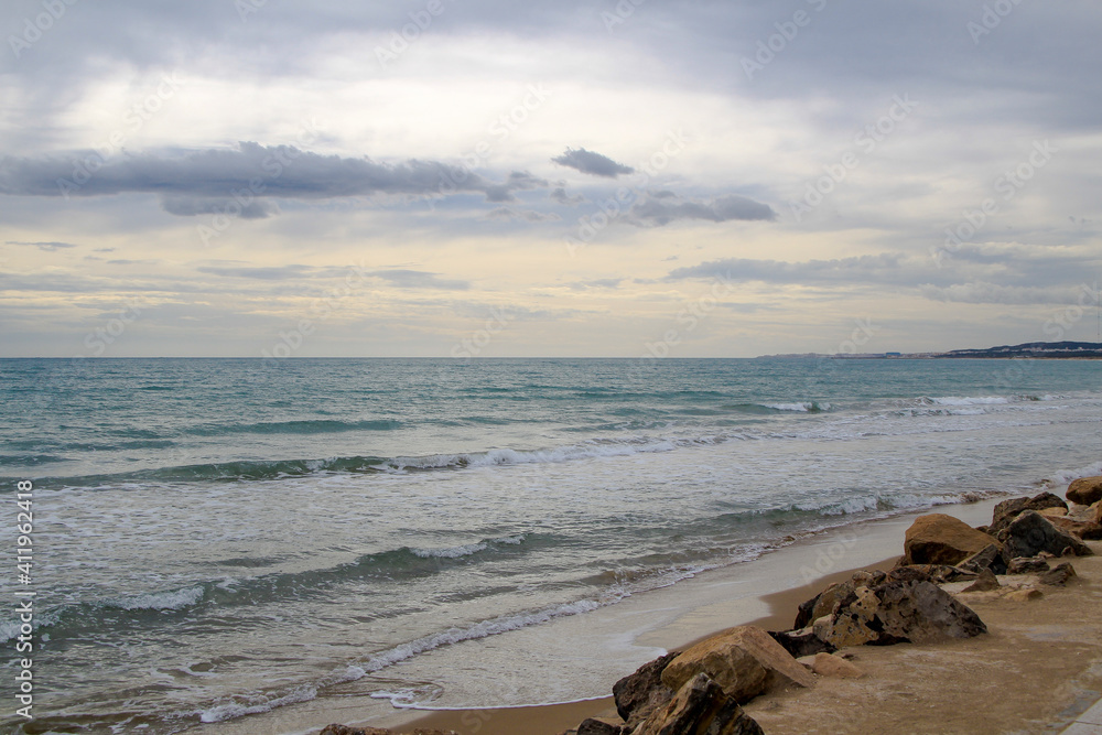 Cloudy day on the beach in winter in Spain