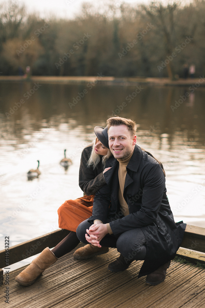 Fototapeta premium man and woman, background lake