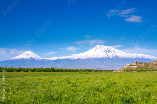 Khor Virap monastery in front of Mount Ararat viewed from Yerevan, Armenia. This snow-capped dormant compound volcano described in the Bible as the resting place of Noah's Ark.