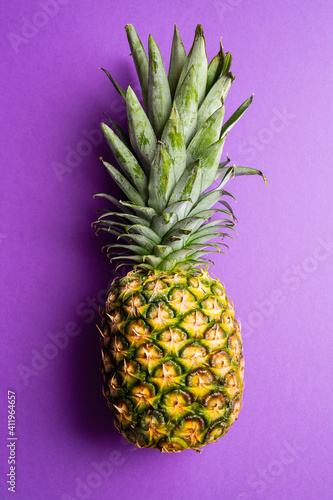 Whole pineapple on purple
