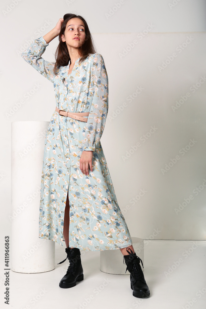 girl in summer printed dress and black boots full body portrait isolated on white girl in summer printed dress and black boots full body portrait isolated on white