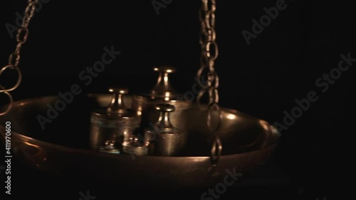 Wallpaper Mural Weighting process on an antique bronze scale plate Torontodigital.ca