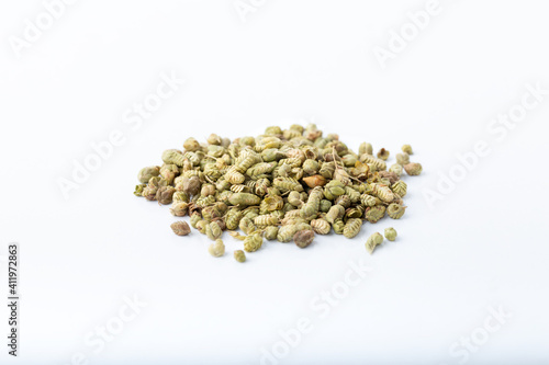Heap of Dried thyme seeds. Isolated on white background. 