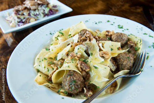 Pappardelle and Meatballs popular in the Tuscan region of Italy.  This wide egg pasta is perfect with heavy meat sauces.