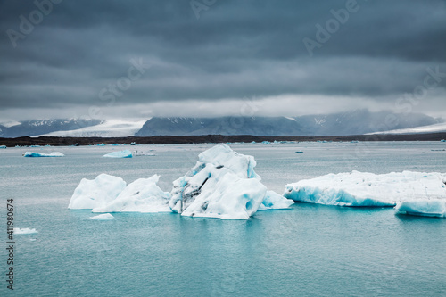 Large pieces of iceberg drifts in the ocean. Location place Jokulsarlon lagoon, Vatnajokull national park, island Iceland.