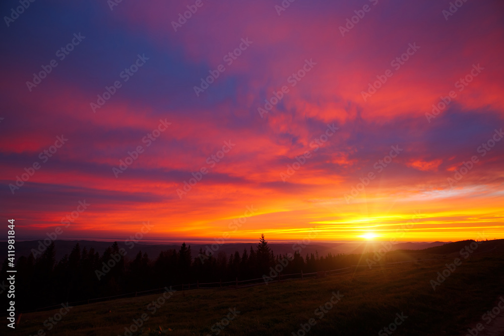 Spectacular colorful sunset with cloudy sky. Photo of textured sky. Spectacular colorful sunset with cloudy sky. Photo of textured sky.