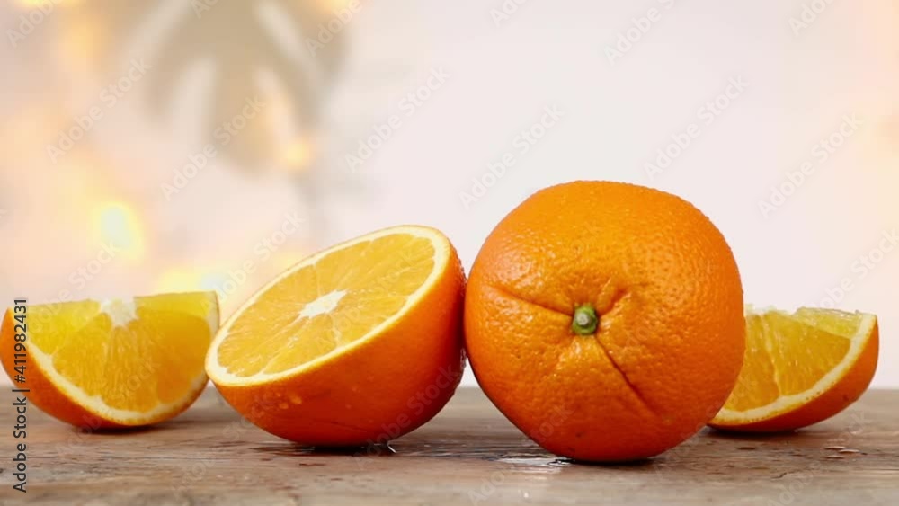 fresh ripe orange fruits whole and slices on wooden table zoom in fresh ripe orange fruits whole and slices on wooden table zoom in