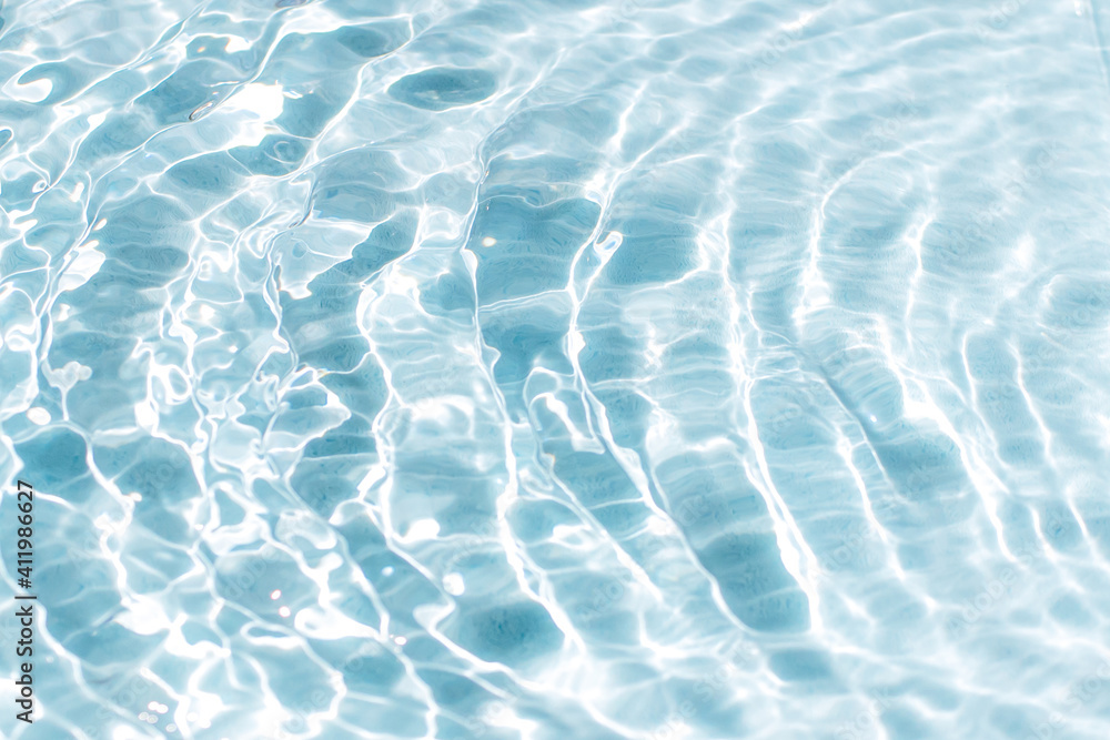 Blue water surface bright sun light reflections, water in swimming pool background. Stock-foto | Stock