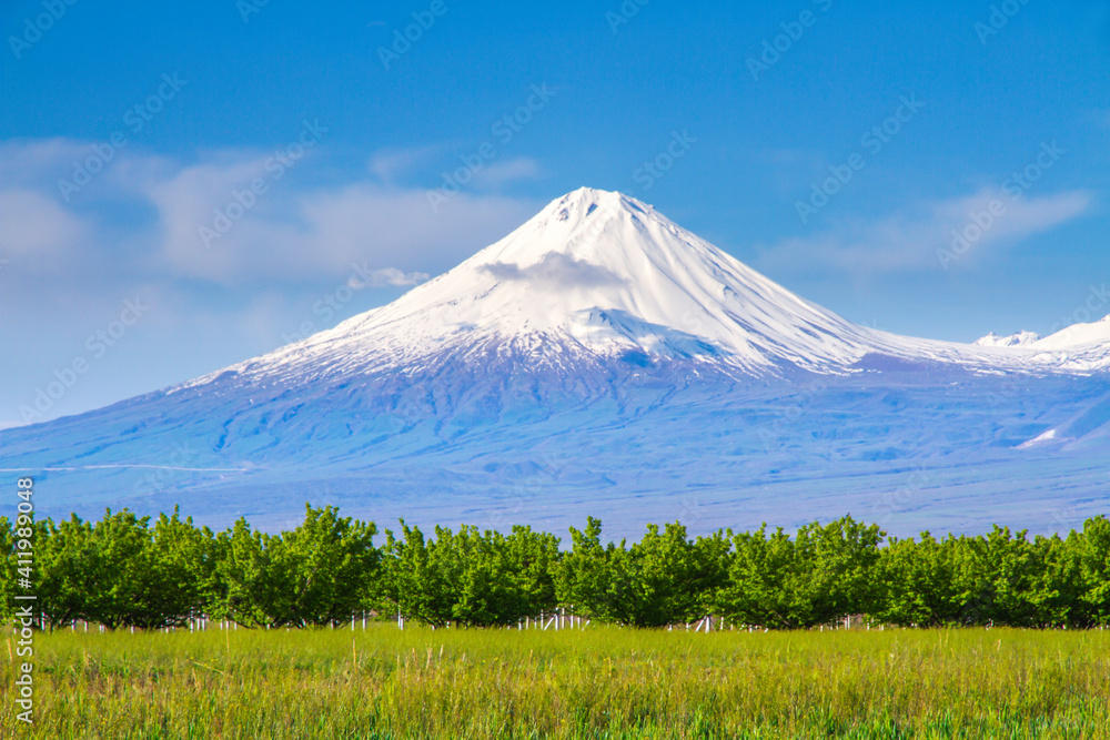 Mount Ararat (Turkey) at 5,137 m viewed from Yerevan, Armenia. This snow-capped dormant compound volcano consists of two major volcanic cones described in the Bible as the resting place of Noah's Ark.