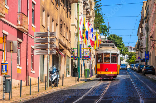 Famous vintage tram in the street of Alfama, Lisbon, Portugal