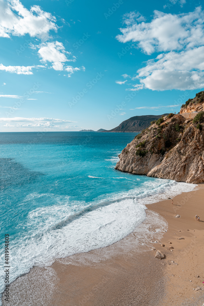 High angle clifftop view turquoise water and nobody on white sand beach Kaputas, Turkey. 