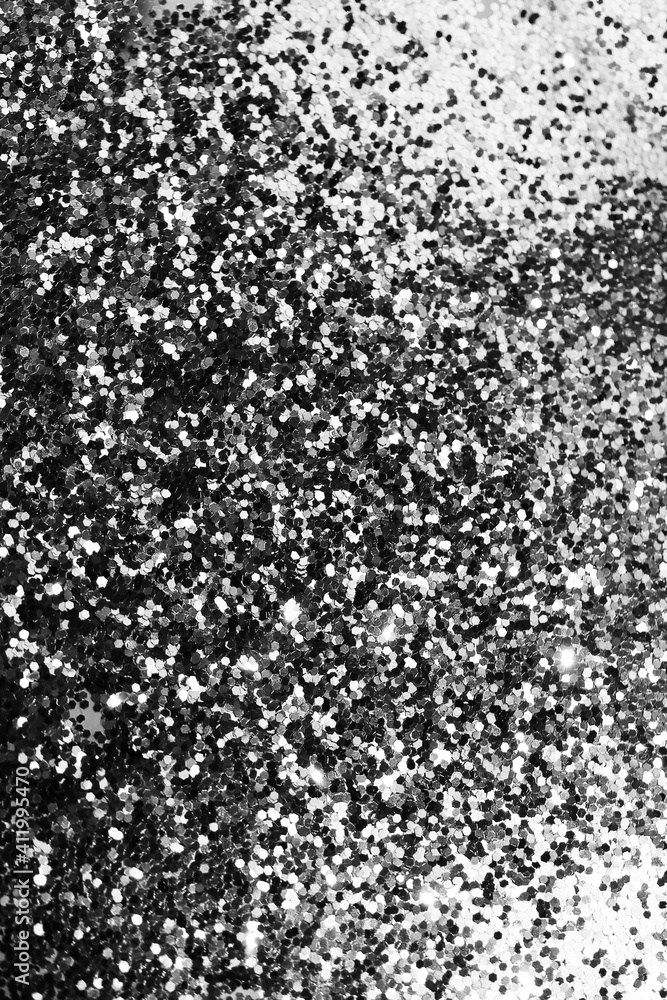 Silver defocused glitter. Bokeh light of gold glitters background. Silver defocused glitter. Bokeh light of gold glitters background.