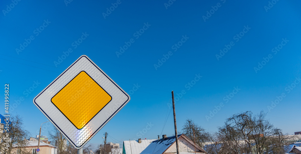 Priority road sign, sign main road on blue sky Priority road sign, sign main road on blue sky