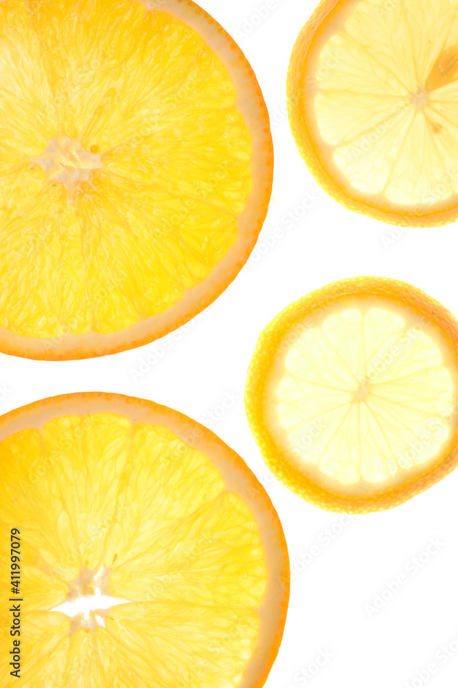 slice of orange and lemon on a white glowing background.