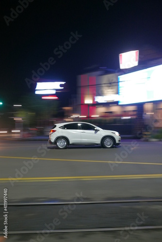 White car in the night ride