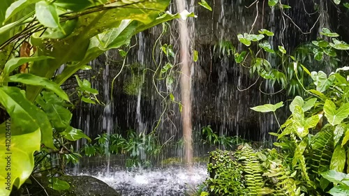 Waterfall in the forest. Discovering waterfall in the forest. Hike through the waterfall.
