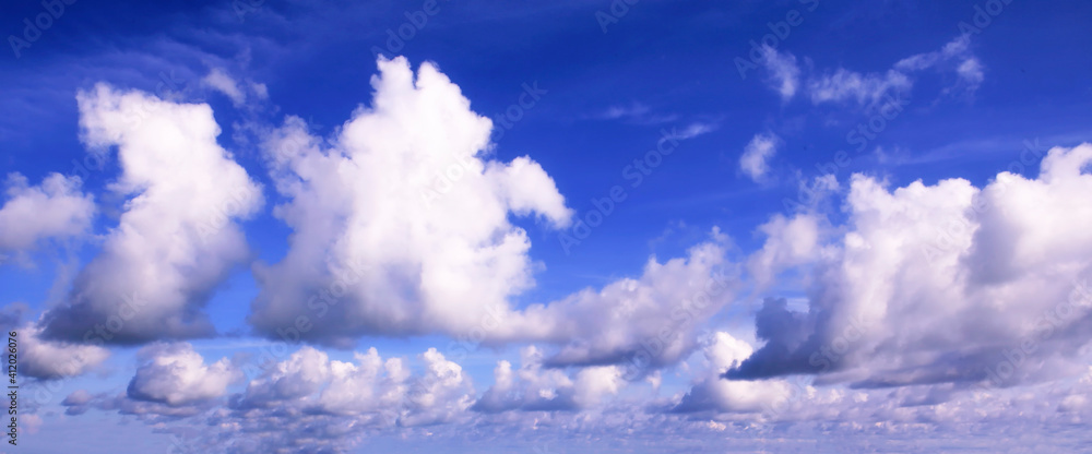 Beautiful blue sky and white fluffy clouds, Vibrant color sky with cloud on a sunny day, The morning sky with clouds in various shapes, Beautiful natural cirrus cloud background. Beautiful blue sky and white fluffy clouds, Vibrant color sky with cloud on a sunny day, The morning sky with clouds in various shapes, Beautiful natural cirrus cloud background.