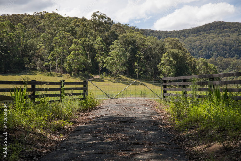 Entry road and gate to farm homestead