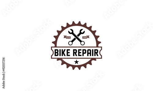 logo for bicycle repair workshop on white background