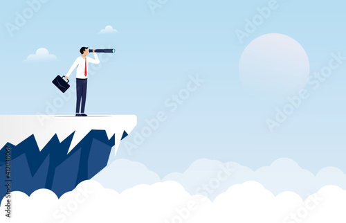 Business concept with businessman holding telescope standing on a cliff symbol.