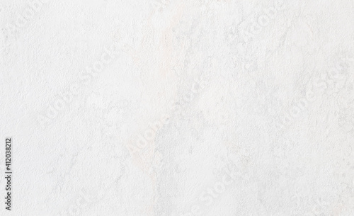 rough white concrete or cement surface background with space for text. architecturural wall or facade background. interior laminated material background.