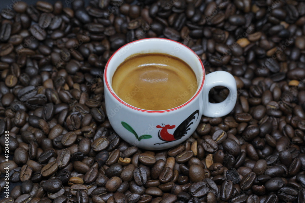 cup of coffee with beans cup of coffee with beans