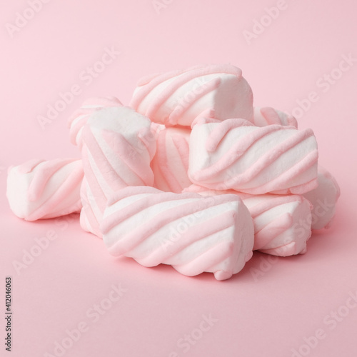 pink and white marshmallows on pink background