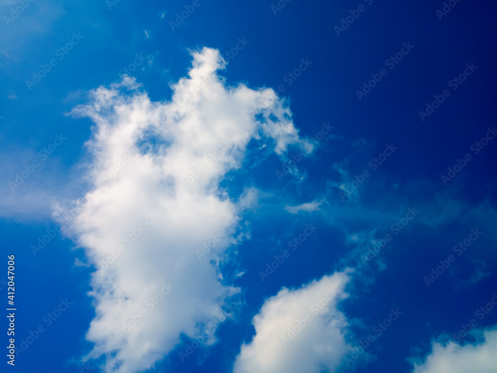 Daytime sky and white clouds as background Daytime sky and white clouds as background