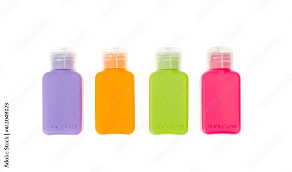 Multi-colored plastic bottles, containers isolated on white background Multi-colored plastic bottles, containers isolated on white background