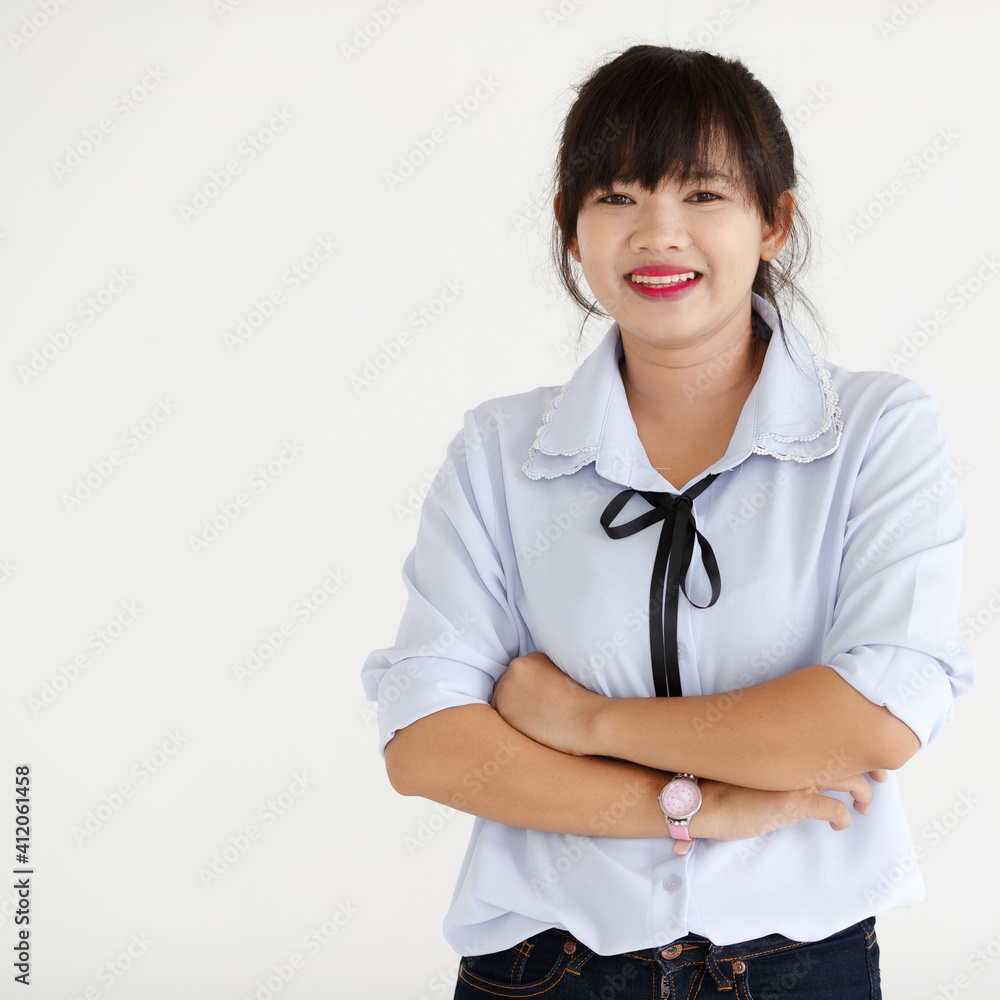 Portrait of a young teen Asian woman with smile face on white background Portrait of a young teen Asian woman with smile face on white background