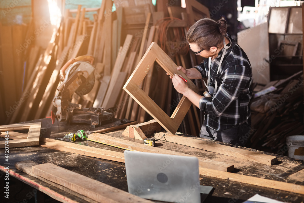 craftsman professional young carpenter man working perpendicular wooden. craftsman professional young carpenter man working perpendicular wooden.