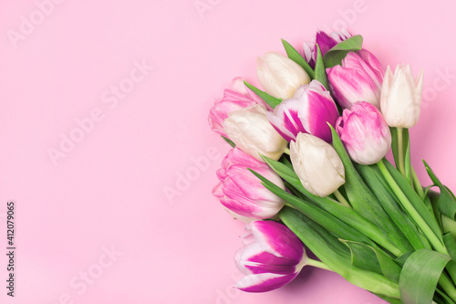 Fototapeta Naklejka Na Ścianę i Meble -  Bouquet of tulips in pink and white colors. Concept of spring, Women's Day, Mother's Day, 8 March, the holiday greetings. Copy space, flat lay.