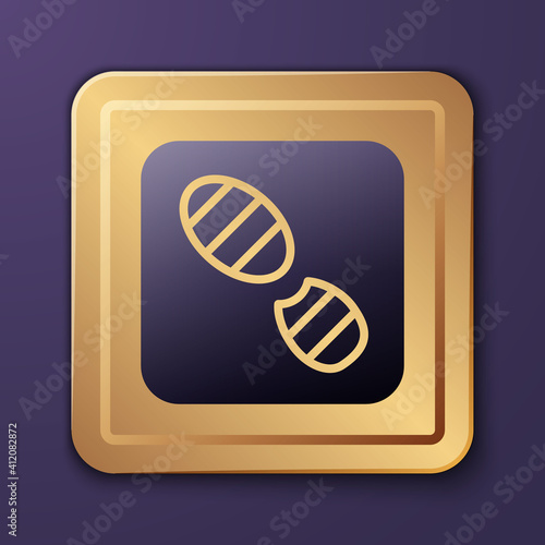 Purple Human footprints shoes icon isolated on purple background. Shoes sole. Gold square button. Vector.