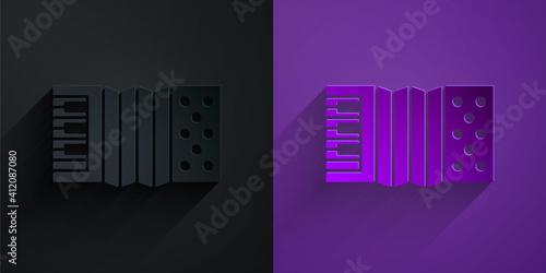 Paper cut Musical instrument accordion icon isolated on black on purple background. Classical bayan, harmonic. Paper art style. Vector.