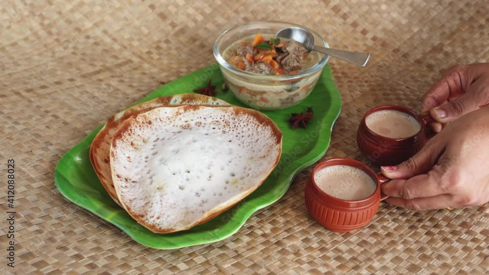 Appam, Hoppers and mutton stew Kerala breakfast food and Indian milk ...