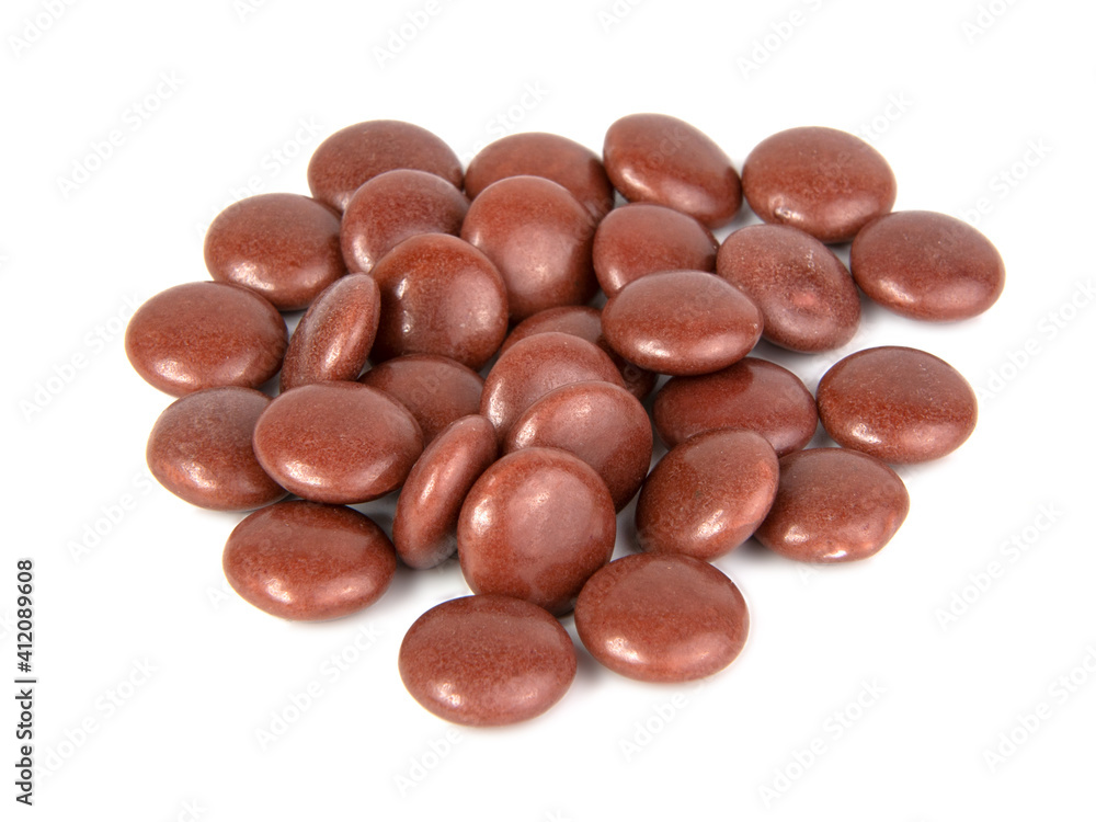 dragee drops chocolate glazed isolated on the white background dragee drops chocolate glazed isolated on the white background