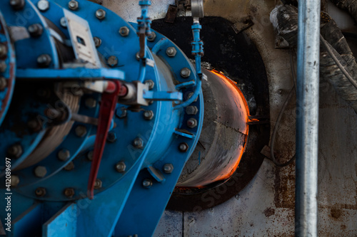 Jambyl Cement plant gas furnace (rotary clinker kiln) for cement  production. close-up. Mynaral, Kazakhstan. photo