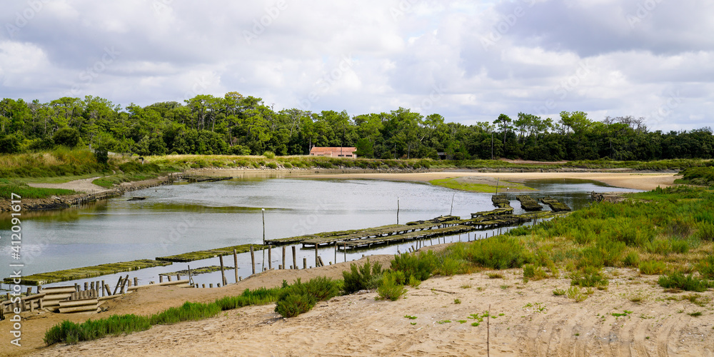 natural beach pool in oyster farm of atlantic ocean coast sea in Talmont France in panorama view natural beach pool in oyster farm of atlantic ocean coast sea in Talmont France in panorama view