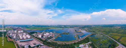 Panorama Aerial view, Solar plant rows array of ground mount system Installation. Crude oil tanker lpg ngv, Solar Photovoltaic