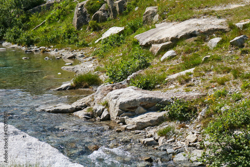 Fiume sul sentiero che porta ai laghi Cornisello nella Val Nambrone in Trentino, viaggi e paesaggi in Itali photo