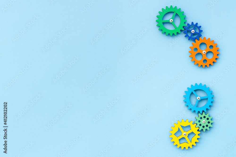 Working gears connect into puzzle, top view. Teamwork and collaboration concept Working gears connect into puzzle, top view. Teamwork and collaboration concept