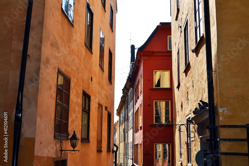 Narrow street with colorful buildings in the Old Town (Gamla Stan), Stockholm center, Sweden