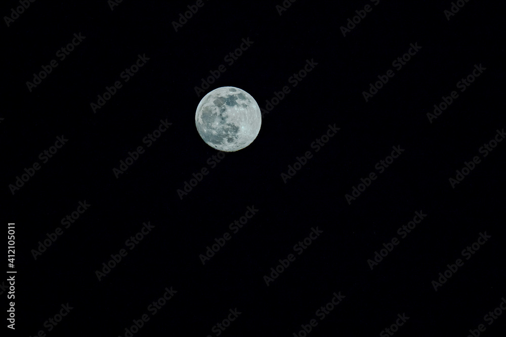 Closeup of full moon. Shining Moon closeup in black background. Soft focus Closeup of full moon. Shining Moon closeup in black background. Soft focus