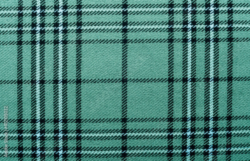 Fabric in a cage. Checkered pattern vector color available in green, gray and black colors. Tartan texture for flannel shirt or other modern fashion textile design. photo