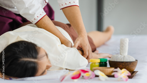 spa and massage concept. Relaxing with hand massage in spa. Thai massage is for healing and relaxation. The Thai massage is Thailand s alternative medicine