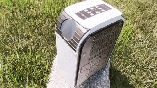 Portable air conditioner. 
The air conditioner is an incredibly useful device in any home, especially one with both heating and cooling function.  photo