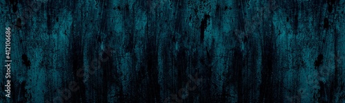 Old scratched blue painted metal surface texture wide panorama. Dark gloomy retro grunge panoramic background